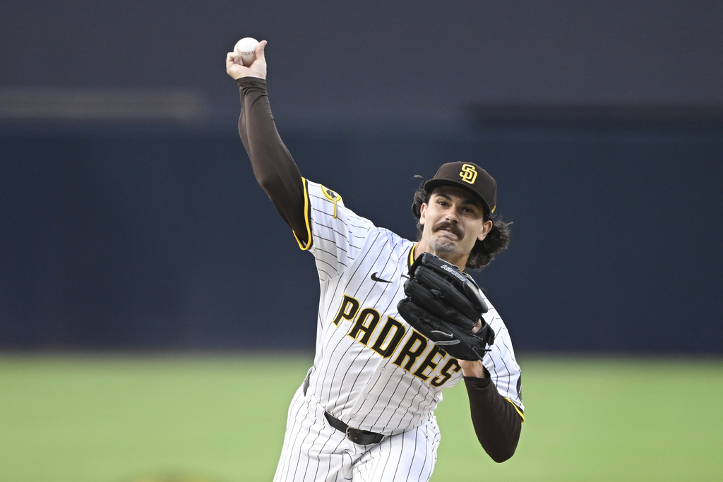 San Diego Padres starting pitcher Dylan Cease delivers during the first inning of a baseball game against the Colorado Rockies, Saturday, Sept. 13, 2025, in San Diego. (AP Photo/Denis Poroy)
