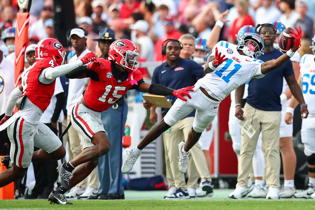 Mississippi wide receiver Deuce Alexander (11) catches a pass during the second half of an NCAA college football game against Georgia, Saturday, Oct. 18, 2025, in Athens, Ga. (AP Photo/Colin Hubbard)
