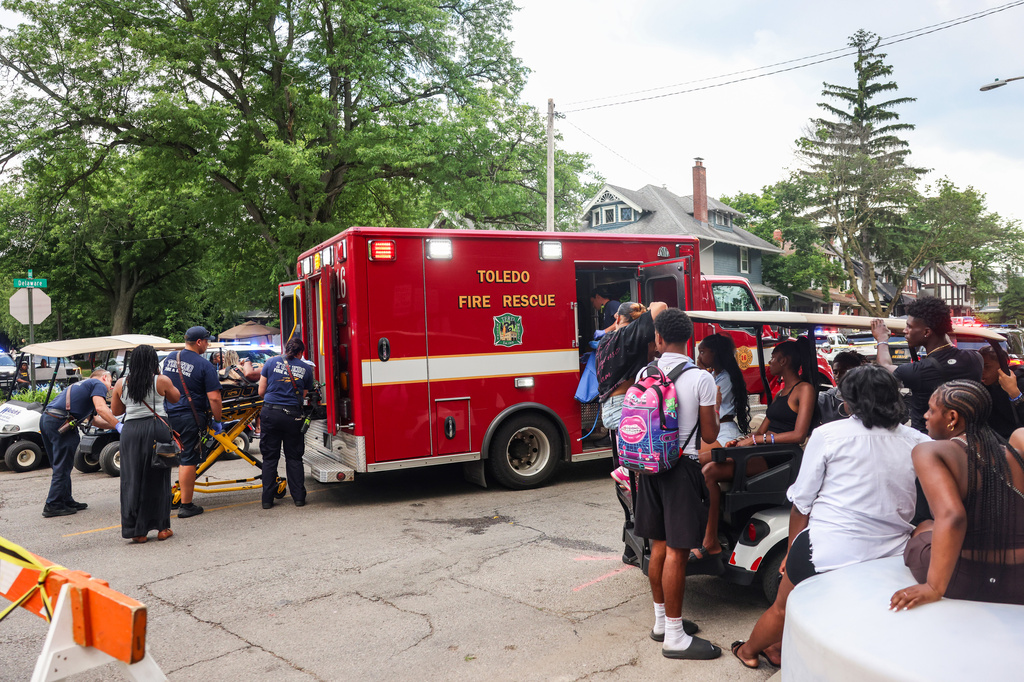 Toledo police investigates a shooting that left 12 people injured at the Old West End Festival at the Agnes Reynolds Jackson Arboretum in Toledo, Ohio, on Saturday, June 6, 2026. (Rebecca Benson/The Blade via AP)