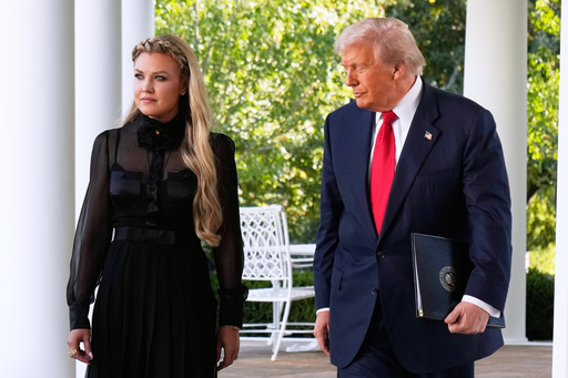 President Donald Trump, with Erika Kirk, walks out to present the Presidential Medal of Freedom for Charlie Kirk to his widow Erika Kirk, in the Rose Garden of the White House, Tuesday, Oct. 14, 2025, in Washington. (AP Photo/Mark Schiefelbein) President Donald Trump, with Erika Kirk, walks out to present the Presidential Medal of Freedom for Charlie Kirk to his widow Erika Kirk, in the Rose Garden of the White House, Tuesday, Oct. 14, 2025, in Washington. (AP Photo/Mark Schiefelbein)