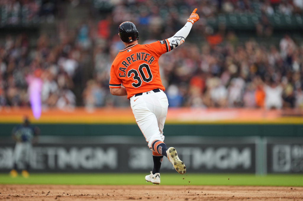 Detroit Tigers' Kerry Carpenter reacts to his two-run home run against the Seattle Mariners during the third inning of a baseball game Friday, June 5, 2026, in Detroit. (AP Photo/Paul Sancya)
