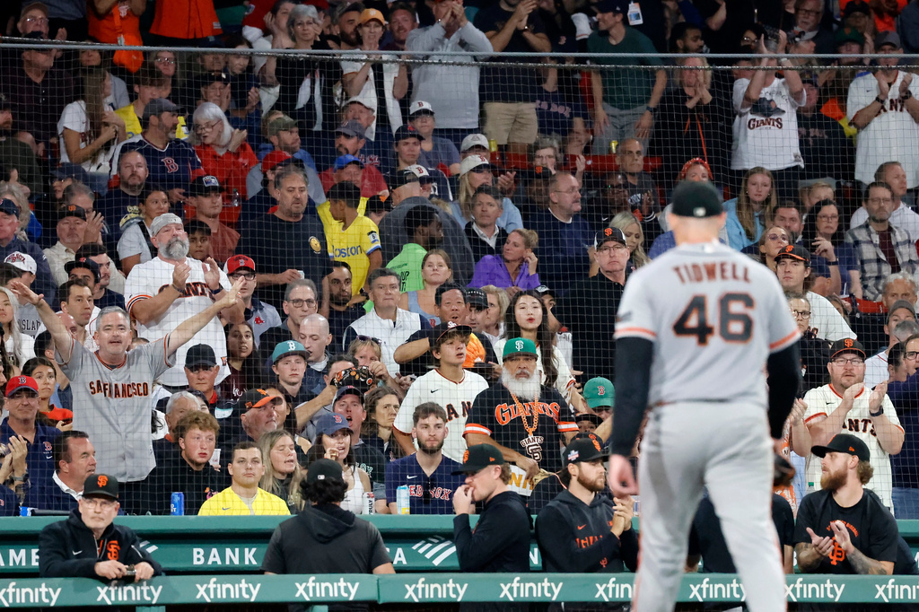 San Francisco Giants fans cheer as starting pitcher Blade Tidwell (46) leaves during the sixth inning of a baseball game against the Boston Red Sox, Saturday, Aug. 22, 2026, in Boston. (AP Photo/Mary Schwalm)