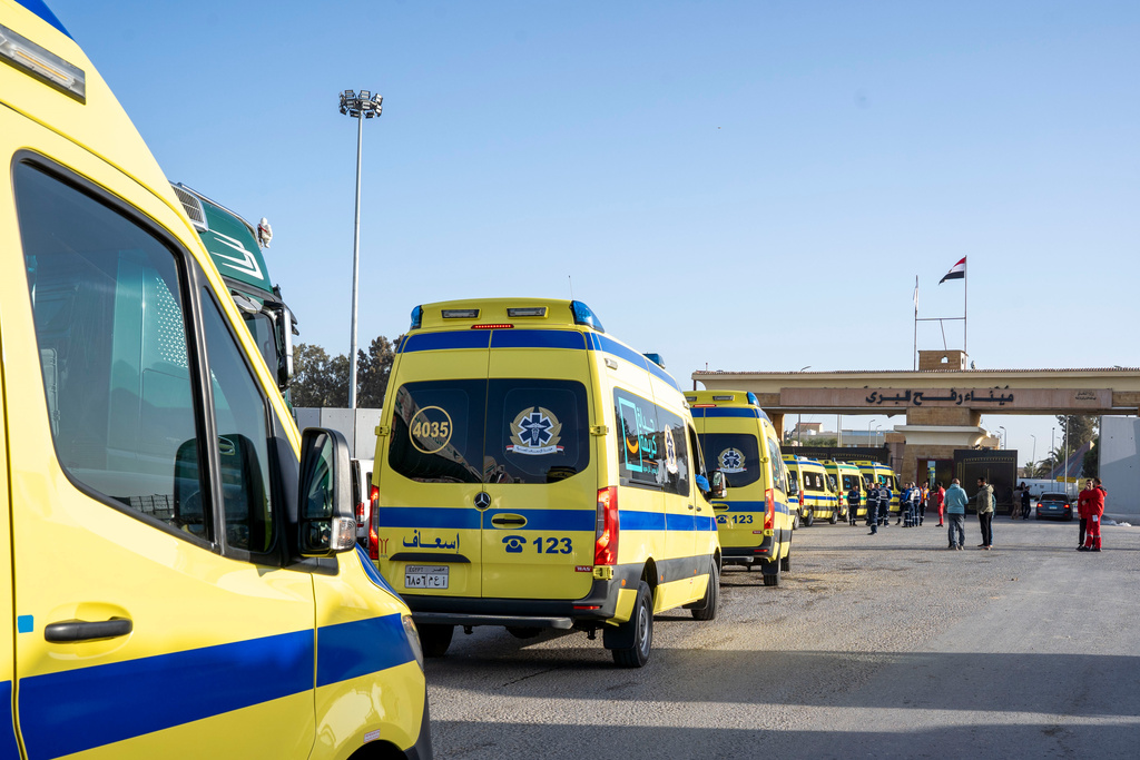 Ambulances line up to enter the Egyptian gate of the Rafah crossing on the way to the Gaza Strip, in Rafah, Egypt, Sunday, Feb. 1, 2026. (AP Photo/Mohamed Arafat)