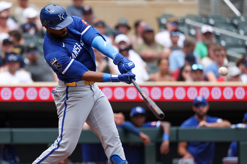 Kansas City Royals designated hitter Starling Marte hits a three-run home run against the Minnesota Twins during the fifth inning of a baseball game, Sunday, June 7, 2026, in Minneapolis. (AP Photo/Matt Krohn)