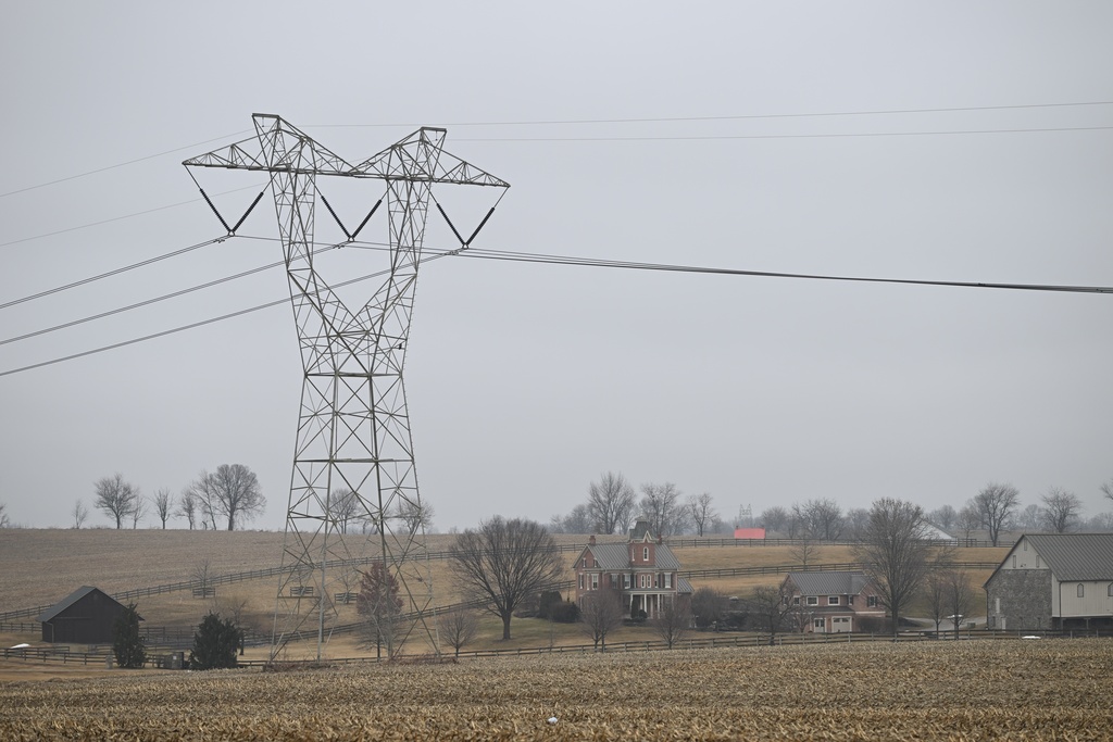 A 500-kilovolt electric transmission line crosses farmland in Mechanicsburg, Pa., on March 5, 2026. (AP Photo/Marc Levy)