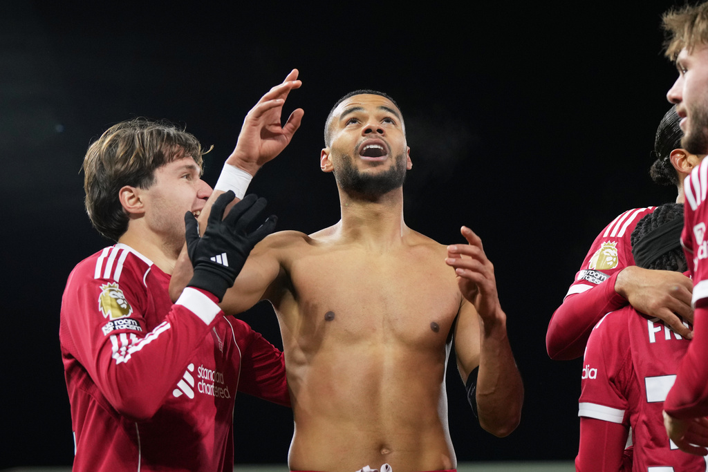 Liverpool's Cody Gakpo celebrates after scoring his side's second goal during the English Premier League soccer match between Fulham and Liverpool in London, Sunday, Jan. 4, 2026. (AP Photo/Alastair Grant)