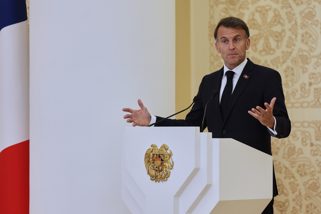 French President Emmanuel Macron addresses a media conference during the EU-Armenia summit at the Presidential Palace in Yerevan, Armenia, Tuesday, May 5, 2026. (AP Photo/Anthony Pizzoferrato)