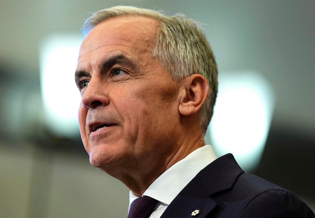 Canada Prime Minister Mark Carney and Ontario Premier Doug Ford, not shown, participate in a joint news conference on Parliament Hill in Ottawa, on Wednesday, Oct. 21, 2026. (Justin Tang/The Canadian Press via AP)