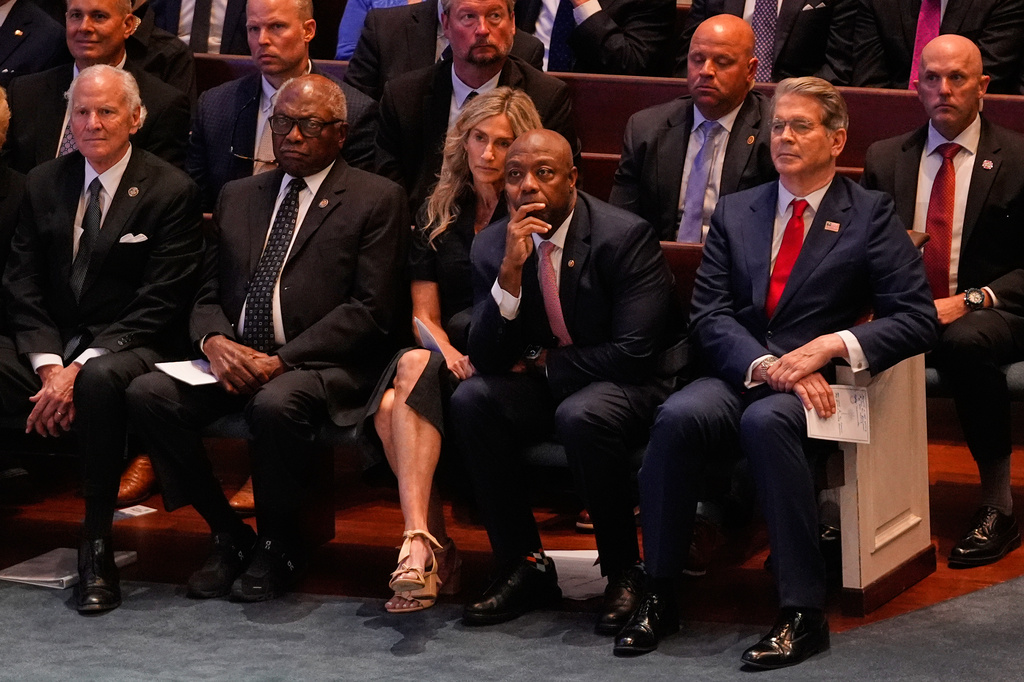 From left, South Carolina Gov. Henry McMaster; Rep. James Clyburn, D-S.C.; wife of Sen. Tim Scott, R-S.C., Mindy Noce; Sen. Scott; and Treasury Secretary Scott Bessent attend the funeral service for the late Sen. Lindsey Graham, R-S.C., at First Baptist Church in Columbia, S.C., Wednesday, July 29, 2026. (AP Photo/Gerald Herbert)