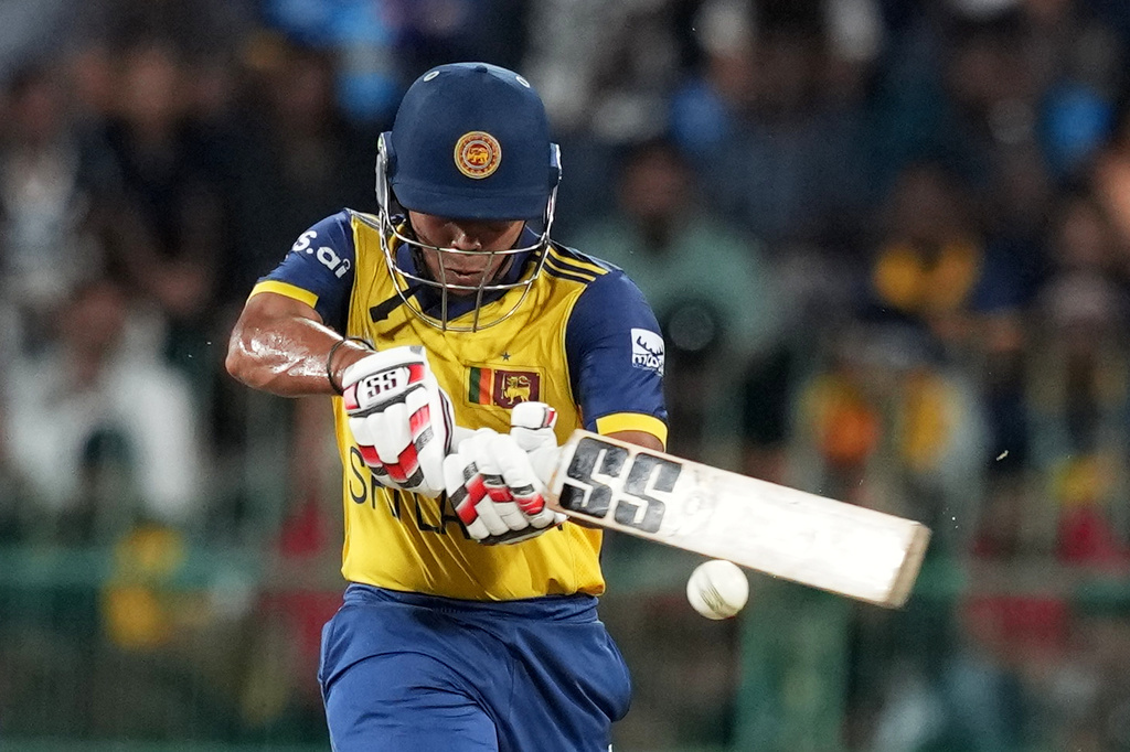 Sri Lanka's Dunith Wellalage plays a shot during the T20 World Cup cricket match between Sri Lanka and New Zealand in Colombo, Sri Lanka, Wednesday, Feb. 25, 2026. (AP Photo/Eranga Jayawardena)