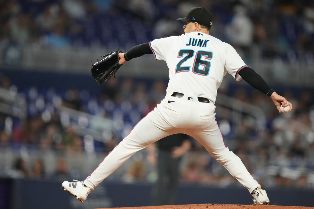 Miami Marlins pitcher Janson Junk (26) throws during the first inning of a baseball game against the Cincinnati Reds, Monday, April 6, 2026, in Miami. (AP Photo/Lynne Sladky)
