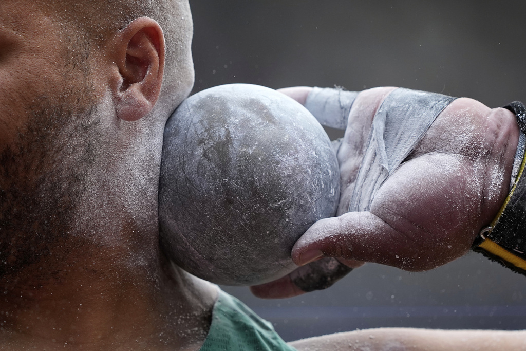 Ireland's Eric Favors makes an attempt in the men's shot put qualification at the World Athletics Championships in Tokyo, Saturday, Sept. 13, 2025. (AP Photo/Matthias Schrader)