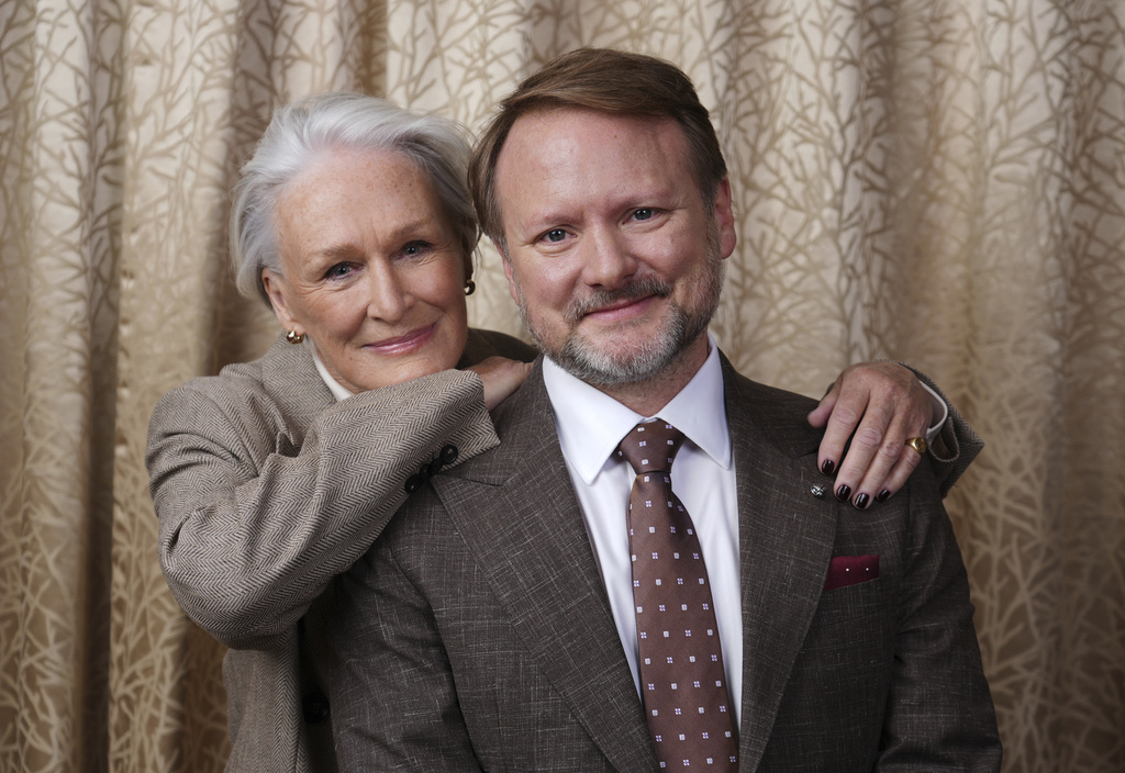 Rian Johnson, right, director of the film "Wake Up Dead Man: A Knives Out Mystery," poses with cast member Glenn Close to promote the film during the Toronto International Film Festival on Sunday, Sept. 7, 2025, in Toronto. (AP Photo/Chris Pizzello)