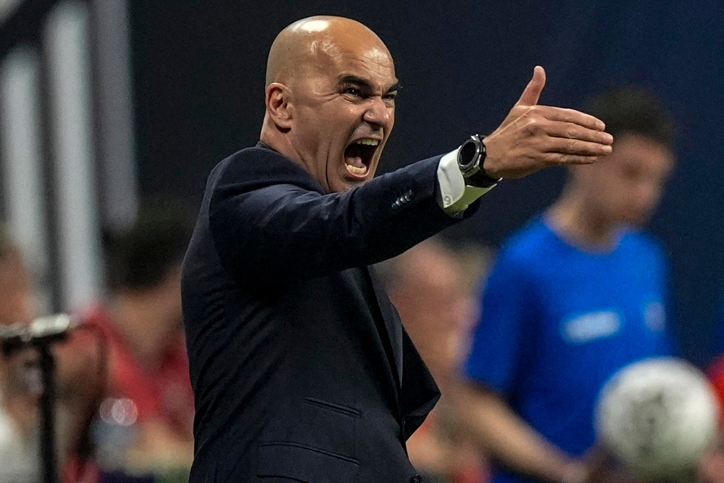 Portugal's coach Roberto Martinez speaks during the first half of an international friendly soccer match against team USA, Tuesday, March 31, 2026, in Atlanta. (AP Photo/Mike Stewart)