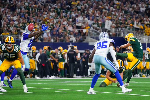 Dallas Cowboys safety Juanyeh Thomas (2) blocks a extra point attempt by Green Bay Packers place kicker Brandon McManus, right, in the first half of an NFL football game Sunday, Sept. 28, 2025, in Arlington, Texas. (AP Photo/Jeffrey McWhorter) Dallas Cowboys safety Juanyeh Thomas (2) blocks a extra point attempt by Green Bay Packers place kicker Brandon McManus, right, in the first half of an NFL football game Sunday, Sept. 28, 2025, in Arlington, Texas. (AP Photo/Jeffrey McWhorter)