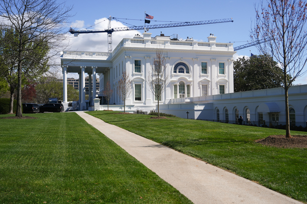 Construction cranes being used for the White House ballroom are seen around the White House, Monday, March 23, 2026, in Washington. (AP Photo/Julia Demaree Nikhinson)
