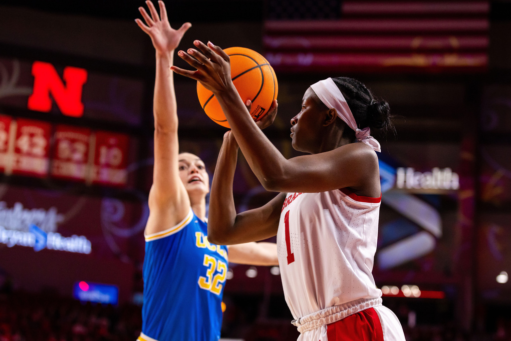 Nebraska guard Hailey Weaver (1) looks to shoot against UCLA forward Angela Dugalić (32) during the first quarter of an NCAA college basketball game, Sunday, Jan. 11, 2026, in Lincoln, Neb. (AP Photo/Bonnie Ryan)