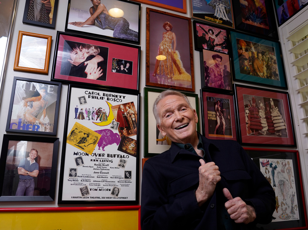 FILE - Costume and fashion designer Bob Mackie poses at his home in Palm Springs, Calif., on Oct. 20, 2021. (AP Photo/Chris Pizzello, File)