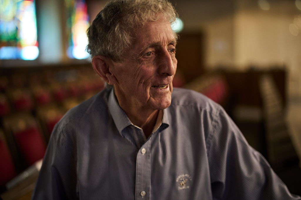 Holocaust survivor Paul Alexander, 87, poses for a photo at Jerusalem Great Synagogue in Jerusalem, Wednesday, Nov. 5, 2025, ahead the 87th anniversary of Kristallnacht or "Night of broken Glass," the November 1938 government-backed pogroms against Jews in Germany and Austria. (AP Photo/Leo Correa)
