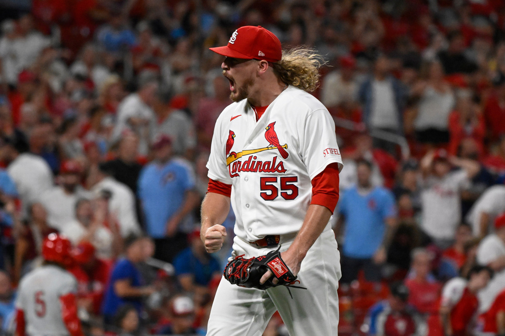 St. Louis Cardinals relief pitcher Ryne Stanek celebrates after Philadelphia Phillies' J.T. Realmuto flies out to end the eighth inning in a baseball game, Tuesday, Aug. 11, 2026, in St. Louis. (AP Photo/Joe Puetz)