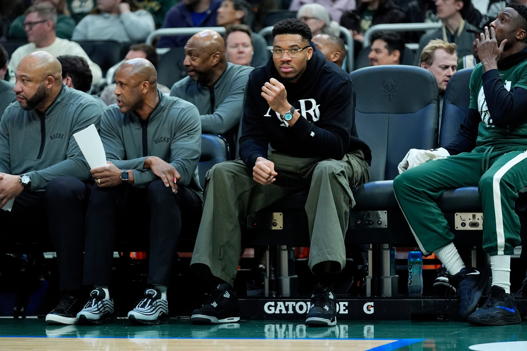 Milwaukee Bucks forward Giannis Antetokounmpo looks on from the bench during the first half of an NBA basketball game against the Indiana Pacers, Friday, Feb. 6, 2026, in Milwaukee. (AP Photo/Aaron Gash)