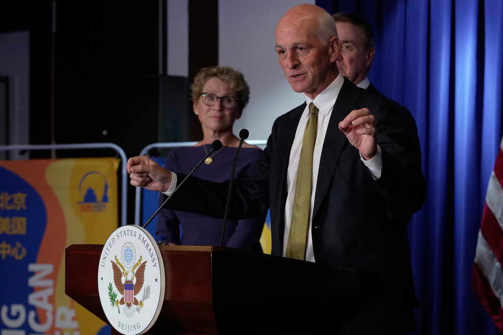 U.S. Rep. Adam Smith, D-Wash, center, speaks during a press conference at the U.S. Embassy in Beijing, China, Tuesday, Sept. 23, 2025. (AP Photo/Mahesh Kumar A.)
