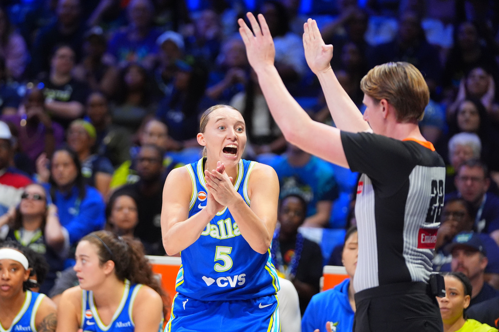 Dallas Wings guard Paige Bueckers (5) reacts to a call during the first half of a WNBA basketball game against the Atlanta Dream in Arlington, Texas, Tuesday, May 12, 2026. (AP Photo/LM Otero)