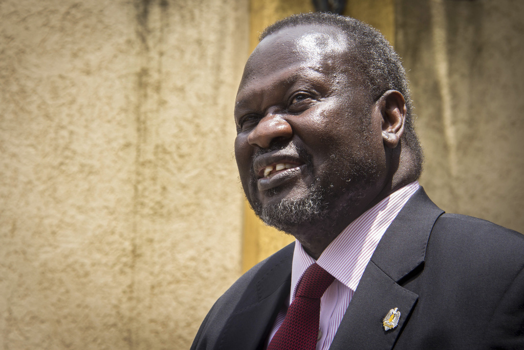 FILE - South Sudan's rebel leader Riek Machar speaks to the media about the situation in South Sudan following a peace agreement the week before with the government, in Addis Ababa, Ethiopia, Monday, Aug. 31, 2015. (AP Photo/Mulugeta Ayene, File)