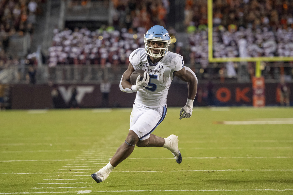 Old Dominion running back Maurki James (5) runs in for a touchdown against Virginia Tech during the first half of an NCAA college football game Saturday, Sept. 13, 2025, in Blacksburg, Va. (AP Photo/Robert Simmons)