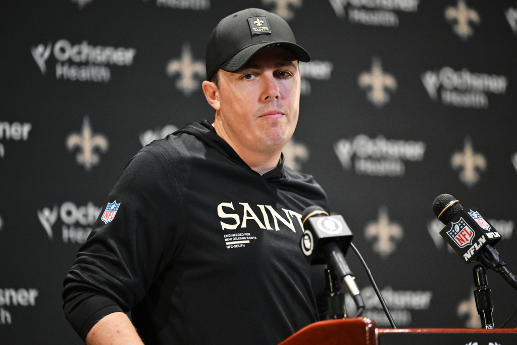 New Orleans Saints head coach Kellen Moore speaks in a news conference after an NFL football game against the New England Patriots, Sunday, Oct. 12, 2025, in New Orleans. (AP Photo/Ella Hall)