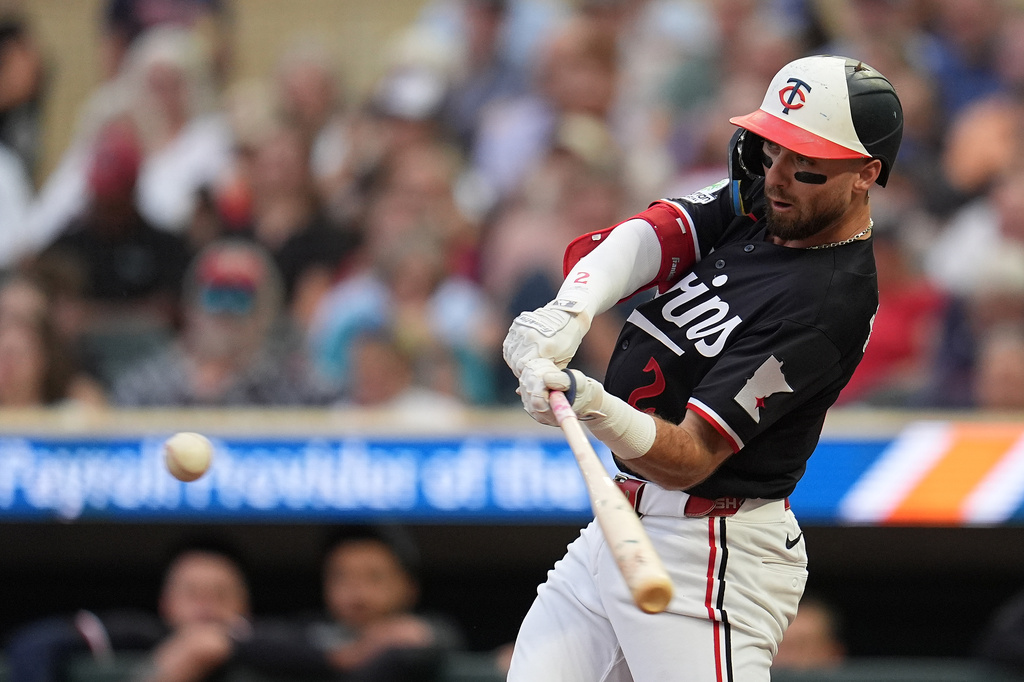 Minnesota Twins' Kody Clemens (2) hits a solo home run during the first inning of a baseball game against the Detroit Tigers Tuesday, Sept. 1, 2026, in Minneapolis. (AP Photo/Abbie Parr)
