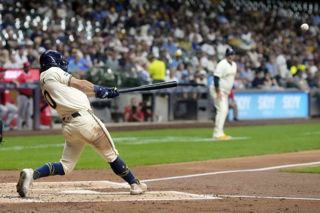 Milwaukee Brewers' Sal Frelick hits a three-run home run during the second inning of a baseball game against the Los Angeles Angels Wednesday, Sept. 17, 2025, in Milwaukee. (AP Photo/Morry Gash)
