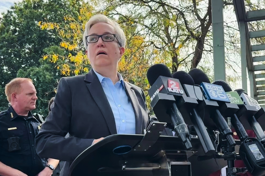 FILE - Democratic Oregon Gov. Tina Kotek speaks at a news conference in Portland, Ore., on Sept. 27, 2025, after Republican President Donald Trump said he would send troops to the city. (AP Photo/Claire Rush, File)