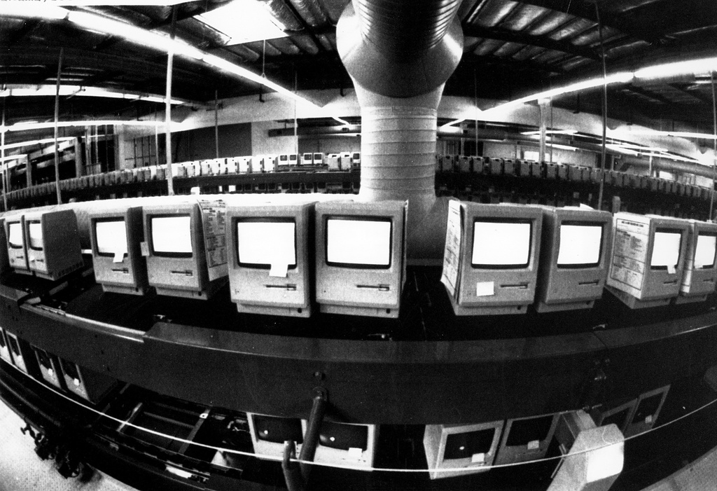 FILE - In this March 28, 1984, file photo, thousands of Apple Macintosh computers sit on double decked manufacturing lines. (AP Photo/Paul Sakuma, File)