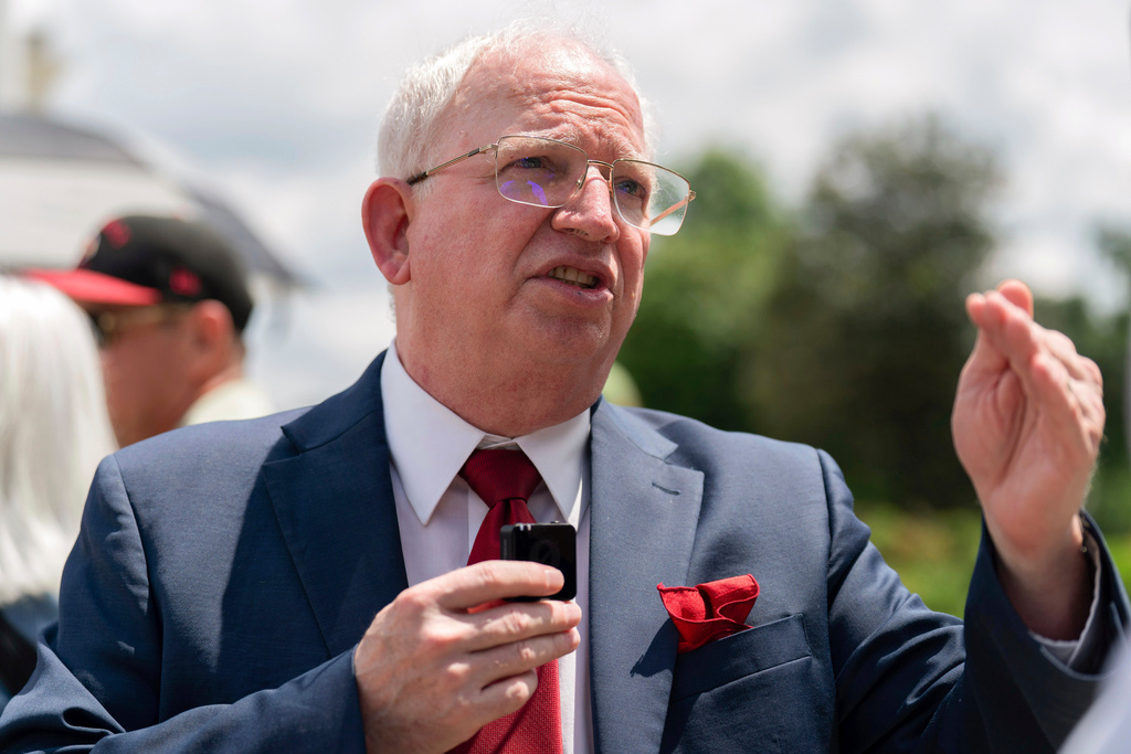 FILE - John Eastman, a California law professor speaks to reporters after the Supreme Court hearing on Birthright Citizenship outside of the Supreme Court in Washington, Thursday, May 15, 2025. (AP Photo/Jose Luis Magana, file)