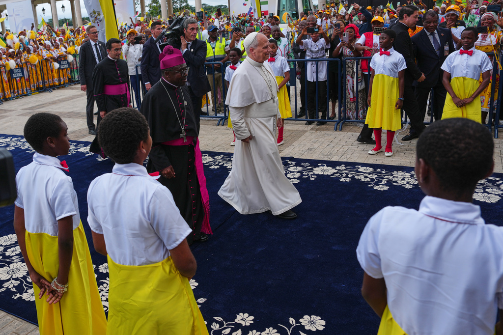 Pope Leo XIV arrives at the Basilica of the Immaculate Conception on the 10th day of his 11-day pastoral visit to Africa, in Mongomo, Equatorial Guinea, Wednesday, April 22, 2026. (AP Photo/Misper Apawu)