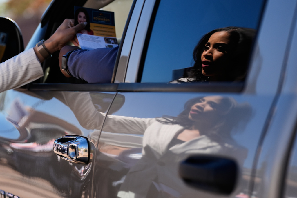 Democratic 18th Congressional District candidate Amanda Edwards greets voters near a polling place on Tuesday, Nov. 4, 2025, in Houston. (AP Photo/Ashley Landis)
