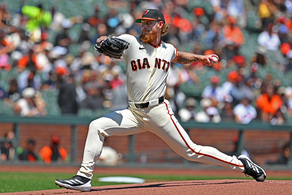 San Francisco Giants pitcher Carson Whisenhunt pitches against the Los Angeles Angels in the first inning of a baseball game in San Francisco, Sunday, July 26, 2026. (Jose Carlos Fajardo/Bay Area News Group via AP)