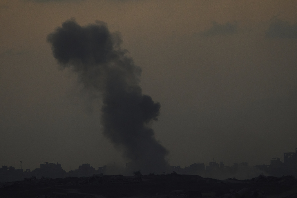 Smoke billows over the Gaza Strip following an Israeli bombardment, as seen from southern Israel, Tuesday, Sept.9, 2025. (AP Photo/Ariel Schalit)