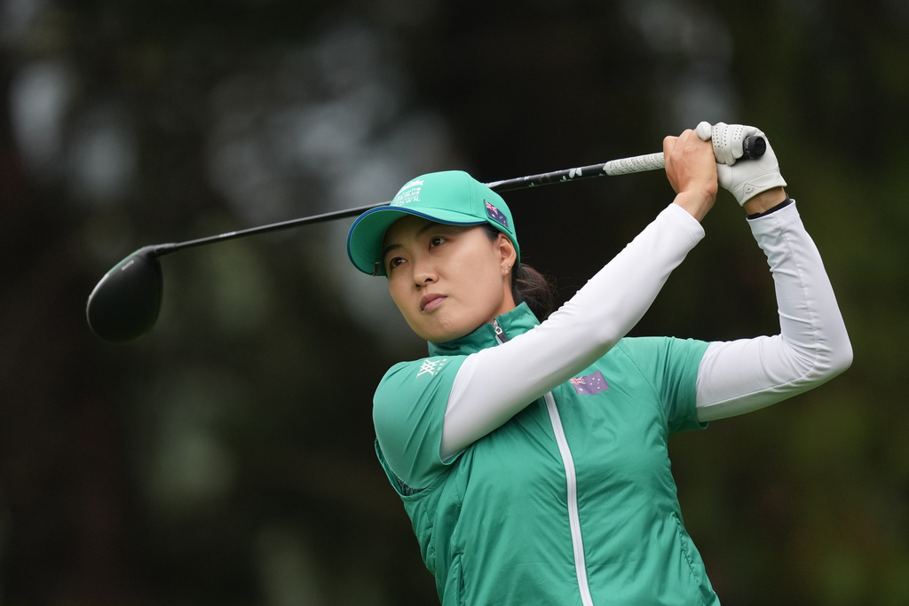 Minjee Lee of Australia tees off on the 3rd hole during the final between the United States team and Australia team for the LPGA International Crown golf tournament at the New Korea Country Club in Goyang, South Korea, Sunday, Oct. 26, 2025. (AP Photo/Lee Jin-man)