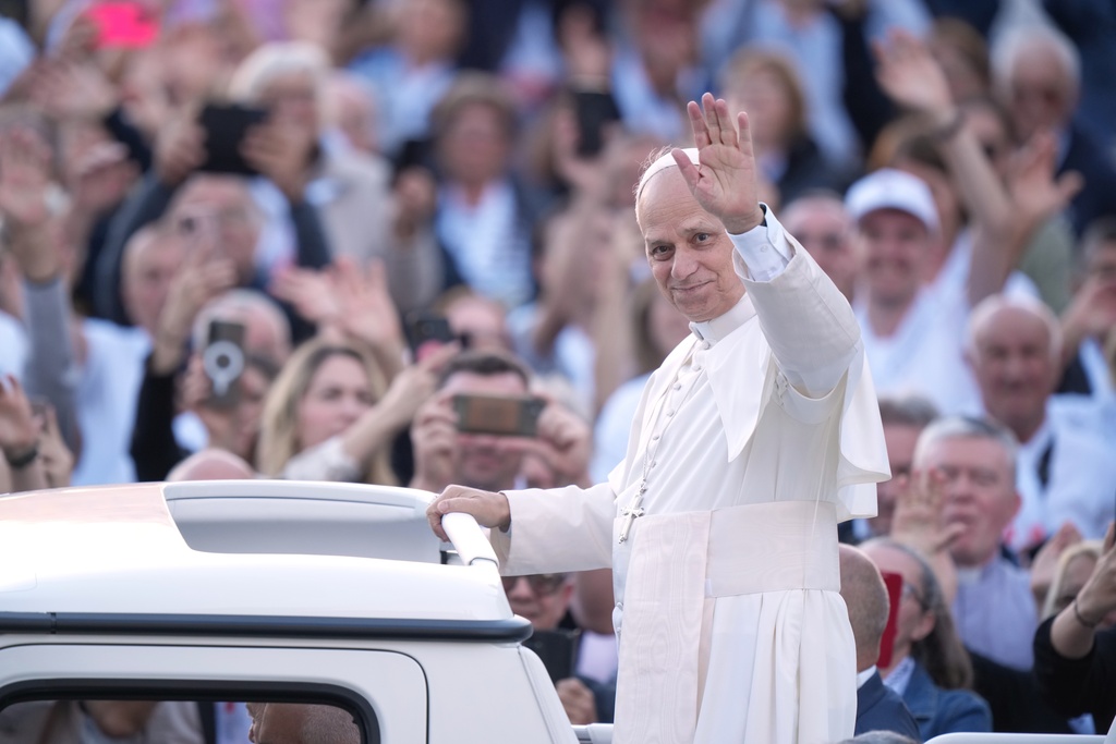 Pope Leo XIV greets pilgrims from Croatia in St. Peter's Square at the Vatican, Tuesday, Oct. 7, 2025. (AP Photo/Andrew Medichini)