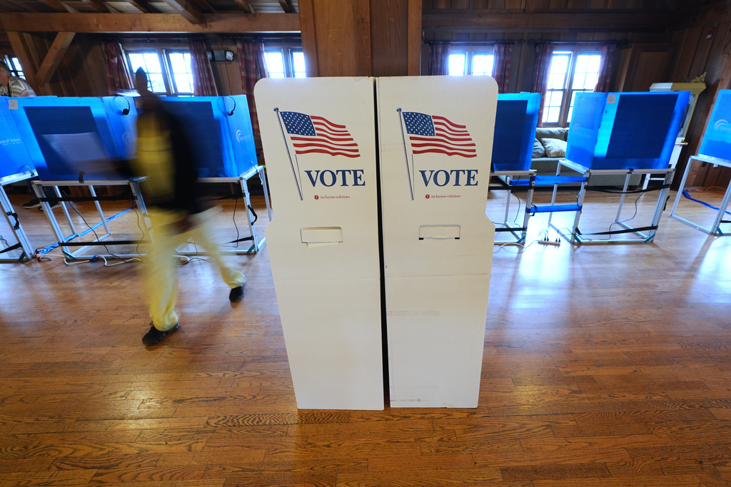 FILE - Signs welcomes voters Nov. 4, 2025, in Del Mar, Calif. (AP Photo/Gregory Bull, File)