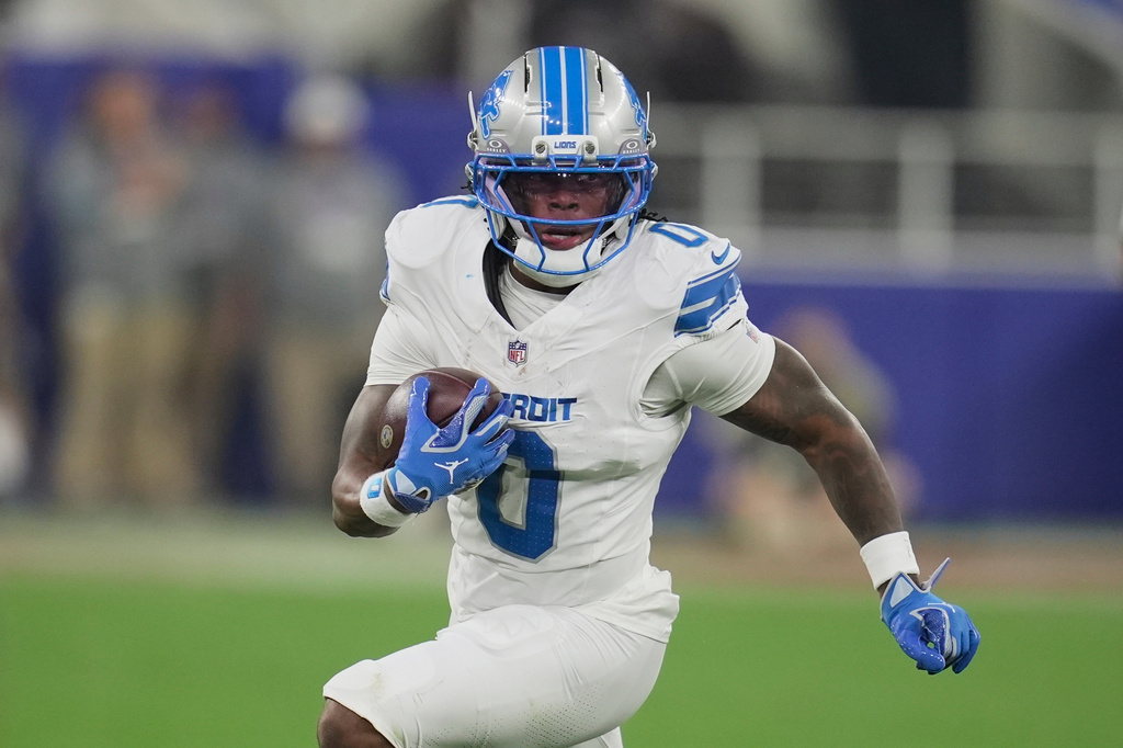 Detroit Lions running back Jahmyr Gibbs (0) runs the ball against the Buffalo Bills during the first half of an NFL football game in Orchard Park, N.Y., Thursday, Sept. 17, 2026. (AP Photo/Sue Ogrocki)