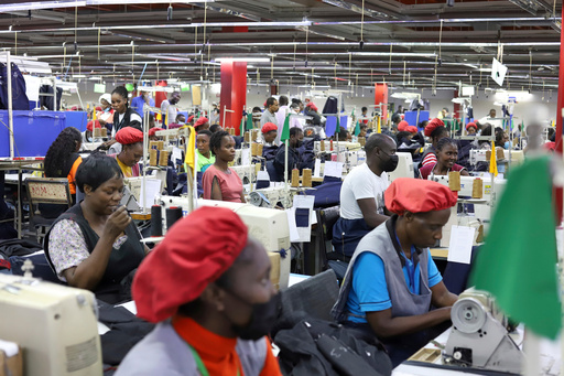FILE - Factory workers operate machines to make garments at United Aryan EPZ Limited in Ruaraka on the outskirts of Nairobi, Kenya, March 21, 2025. (AP Photo/Andrew Kasuku, File) FILE - Factory workers operate machines to make garments at United Aryan EPZ Limited in Ruaraka on the outskirts of Nairobi, Kenya, March 21, 2025. (AP Photo/Andrew Kasuku, File)
