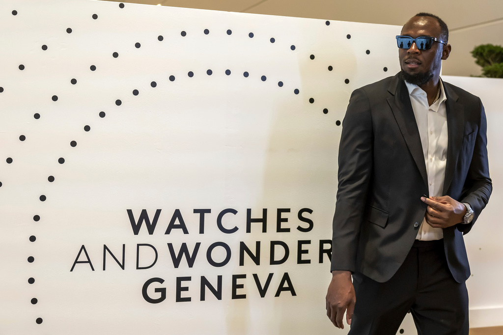 FILE - Former Jamaican sprinter Usain Bolt arrives for a photo call into Hublot stand, during the "Watches and Wonders Geneva" luxury watch fair, in Geneva, Switzerland, April 2, 2025. (Salvatore Di Nolfi/Keystone via AP, file)