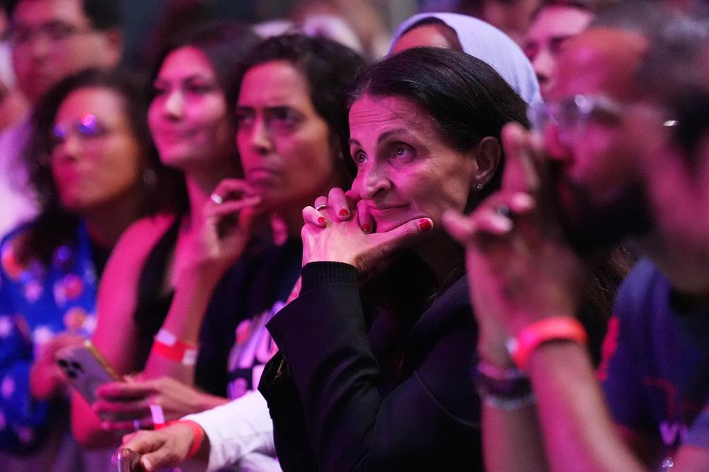 Attendees listen as Abdul El-Sayed, a progressive candidate in the Democratic primary for U.S. Senate in Michigan, speaks during a primary election night event Wednesday, Aug. 5, 2026, at the Majestic Theatre in Detroit. (AP Photo/Julia Demaree Nikhinson)