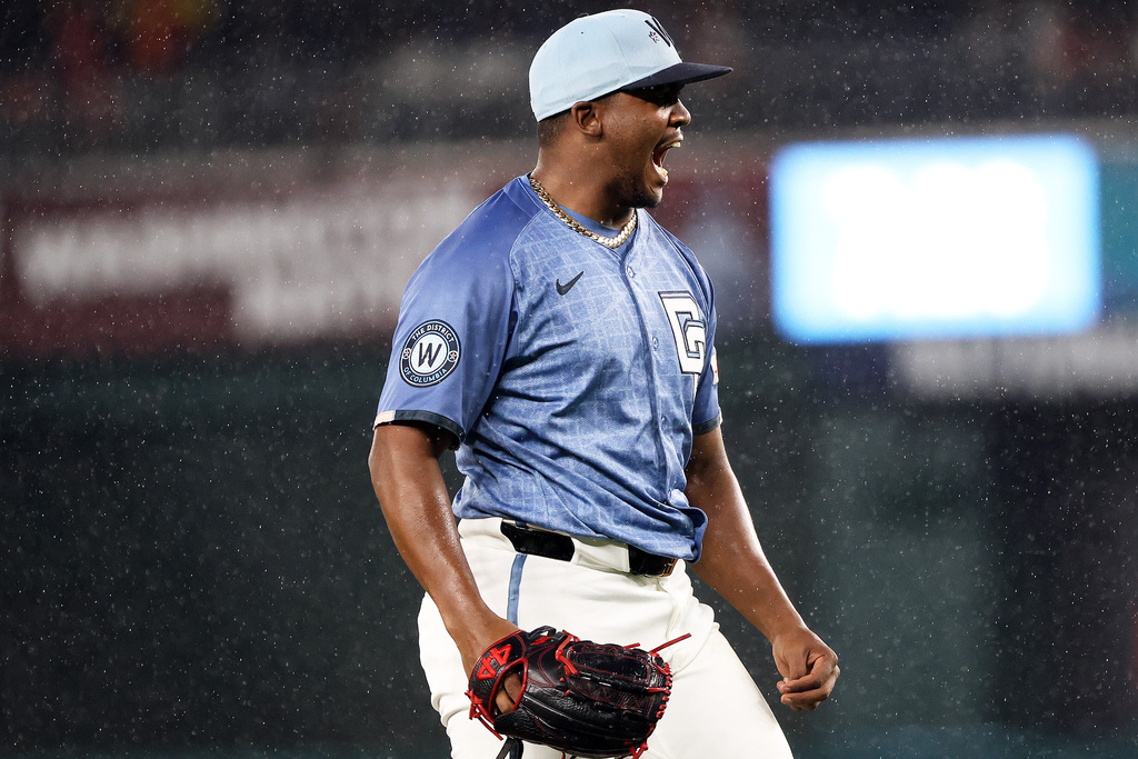 Washington Nationals pitcher Jose A. Ferrer celebrates after a baseball game against the Chicago White Sox, Saturday, Sept. 27, 2025, in Washington. (AP Photo/Daniel Kucin Jr.)