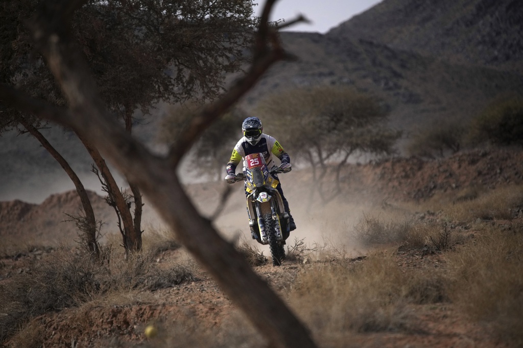 Jerome Martiny of Belgium rides during the fifth stage of the Dakar Rally between Alula and Hail, Saudi Arabia, Thursday, Jan. 9, 2025. (AP Photo/Christophe Ena)