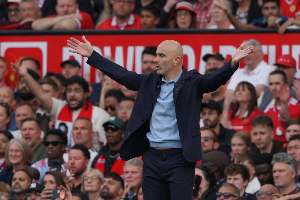 Manchester City's head coach Enzo Maresca gestures during the English Premier League soccer match between Manchester United and Manchester City in Manchester, England, Sunday, Sept. 13, 2026. (AP Photo/Ian Hodgson)
