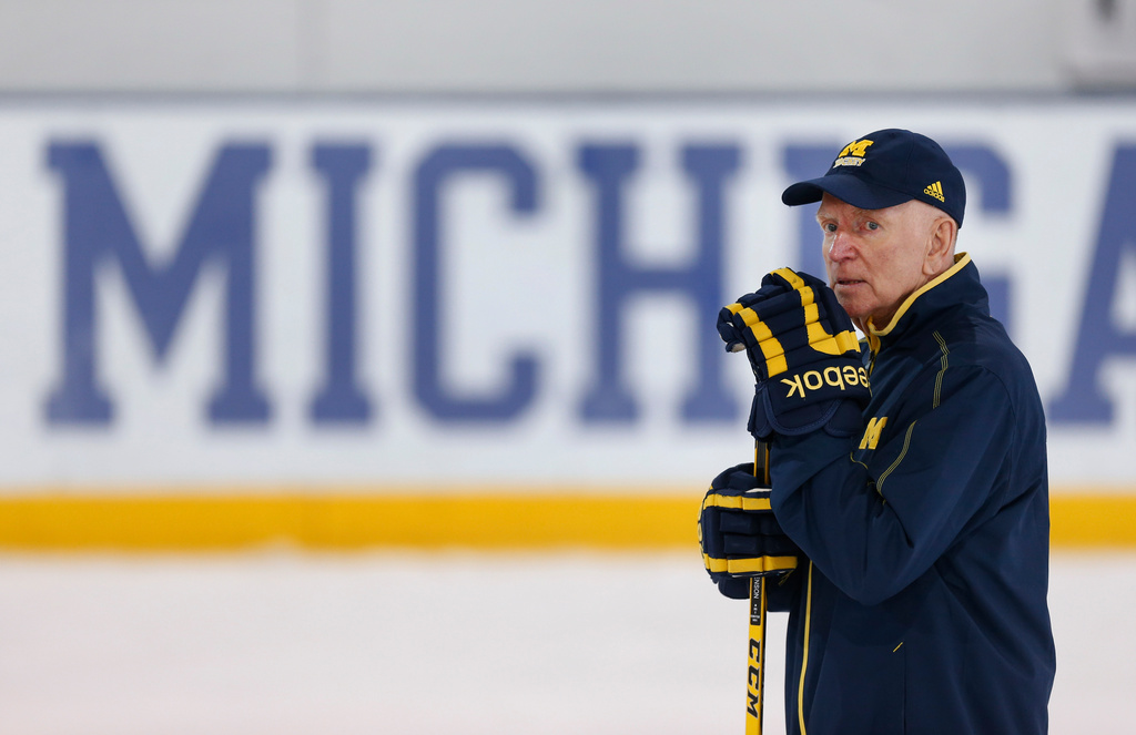 FILE - Michigan hockey coach Red Berenson watches NCAA college hockey practice in Ann Arbor, Mich., Tuesday, March 22, 2016. (AP Photo/Paul Sancya, File)